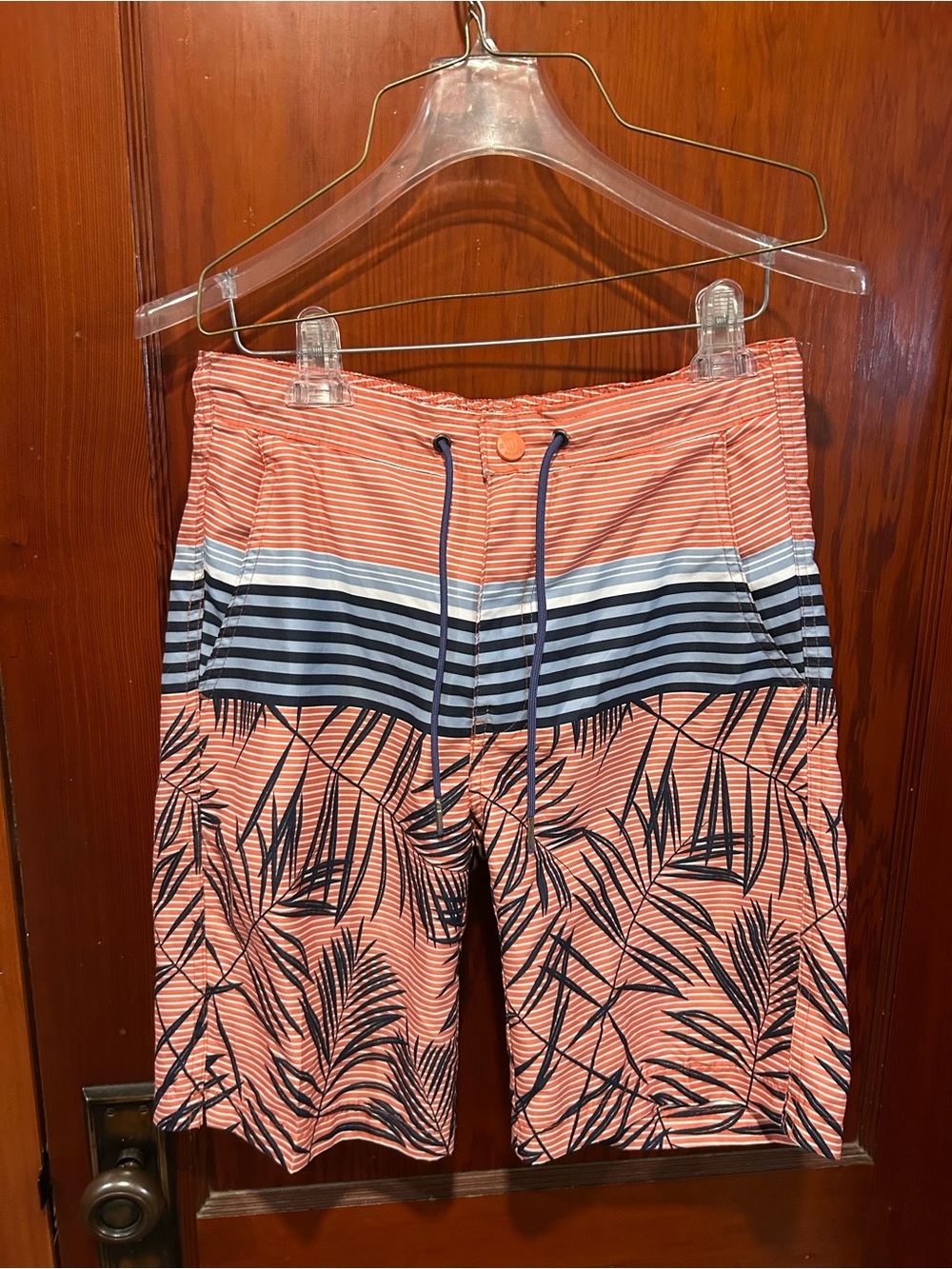 Men’s striped bathing suit with leaves orange and navy blue
